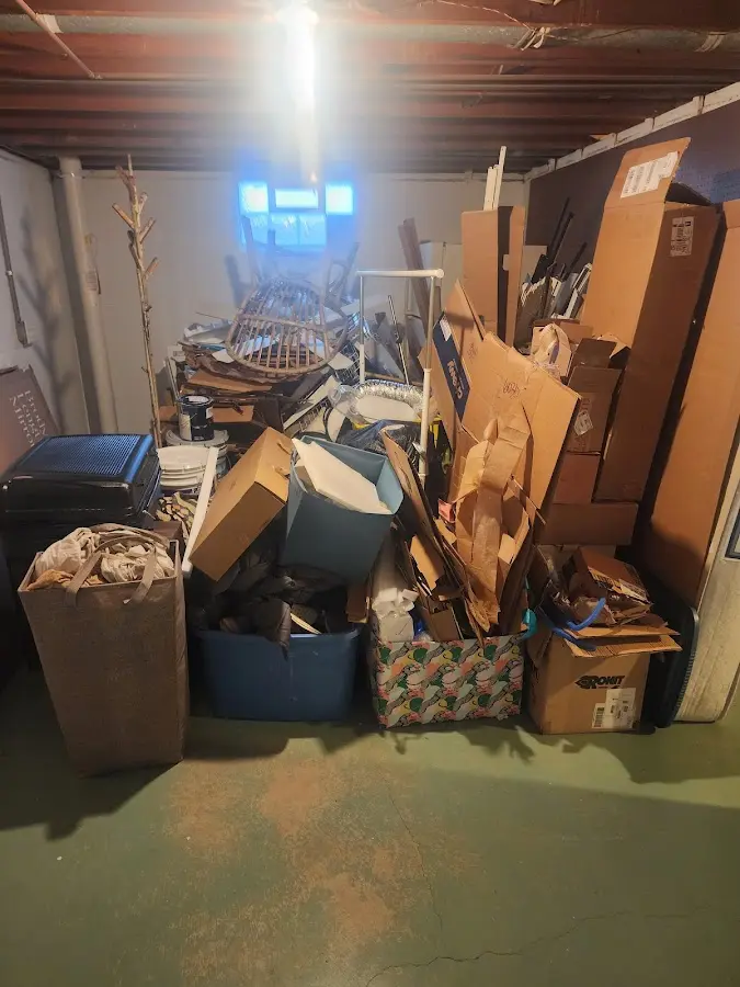 Roll-off dumpster container at job site for 4 Yard Dumpster Rental in Hickory Creek